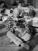 Picasso with the goat Esmeralda at Christmas 1956. She was a Christmas present from Jacqueline. La Californie, Cannes 1956. - Photo by Edward Quinn