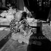 Pablo Picasso with the goat Esmeralda at Christmas 1956. She was a Christmas present from Jacqueline. La Californie, Cannes 1956. - Photo by Edward Quinn