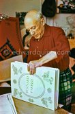 Pablo Picasso with with a book about Bernard Palissy, French potter of the 16th century. La Californie, Cannes 1957. - Photo by Edward Quinn