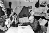 Picasso and Jacqueline viewing a book about Bernard Palissy, French potter of the 16th century. La Californie, Cannes 1957. - Photo by Edward Quinn