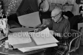 Pablo Picasso with a portfolio of his drawings. La Californie, Cannes 1957. - Photo by Edward Quinn