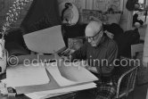 Pablo Picasso with a portfolio of his drawings. La Californie, Cannes 1957. - Photo by Edward Quinn