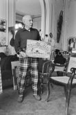 Pablo Picasso with bullfight painting by Claude Picasso. La Californie, Cannes 1957. - Photo by Edward Quinn