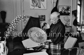 Pablo Picasso with silver plate. La Californie, Cannes 1957. - Photo by Edward Quinn