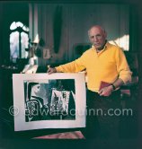 Pablo Picasso with colorized "Femme dans l'atelier" for Edward Quinn. La Californie, Cannes 21.11.1957. - Photo by Edward Quinn