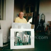 Pablo Picasso with "Femme dans l'atelier" for Edward Quinn. La Californie, Cannes 21.11.1957. - Photo by Edward Quinn
