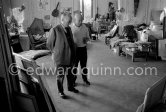 Jaime Sabartés and Pablo Picasso critically examine a portrait of Jacqueline. Pablo Picasso valued Sabartés' opinion highly. They met in 1899 as members of a group of artists which regularly met in the els 4 gats, a cafe in Barcelona. They remained friends ever since. La Californie, Cannes 1957. - Photo by Edward Quinn