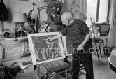 Pablo Picasso with linocut "Picador et taureau". La Californie, Cannes 1959. - Photo by Edward Quinn