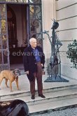 Pablo Picasso and boxer dog Jan. La Californie, Cannes 1959. - Photo by Edward Quinn
