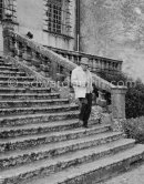Pablo Picasso on the stairs of Château de Vauvenargues, where he lived from 1959-62, near Aix-en-Provence. A great square building dating from the sixteenth and eighteenth centuries. Vauvenargues 1960. - Photo by Edward Quinn
