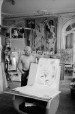 Pablo Picasso showing his original lithograph for the poster announcing his 1960. show in Nice. La Californie, Cannes 1960. - Photo by Edward Quinn