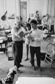 Picasso's children Paloma and Claude are spending their school holidays with him. and here he introduces them to a new pet, a talking parrot, which is squatting on his arm. La Californie, Cannes 1960. - Photo by Edward Quinn