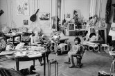 Pablo Picasso and his daughter Paloma Picasso, sitting on sculpture "Le chat". Dachshund Lump under the table. La Californie, Cannes 1960. - Photo by Edward Quinn