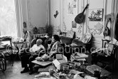 Pablo Picasso and Jacqueline with dachshund Ma Jolie. A table by Joseph-Marius Tiola on the left. La Californie, Cannes 1961. - Photo by Edward Quinn
