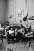 Pablo Picasso and Jacqueline (she is wearing a blouse made from a textile designed by Pablo Picasso) with dachshund Ma Jolie. La Californie, Cannes 1961. - Photo by Edward Quinn