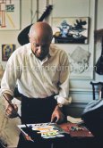 Pablo Picasso working on gouache with Caran d'Ache wax oil pastels and water color. Pablo Picasso always liked surprises and in his work he encouraged unpredictable outcomes. La Californie, Cannes 1961. - Photo by Edward Quinn