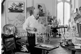 Pablo Picasso working on gouache with Caran d'ache wax oil pastels and water color. Pablo Picasso always liked surprises and in his work he encouraged unpredictable outcomes. here he has used an old drawing paper due to blot the wet gouache and examines the results with interest. La Californie, Cannes 1961. - Photo by Edward Quinn