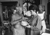 Pablo Picasso and Catherine Hutin. On the right the wife of Spanish painter Antoni Clavé. La Californie, Cannes 1961. - Photo by Edward Quinn