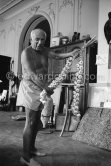 Pablo Picasso with a garlic braid. La Californie, Cannes 1961. - Photo by Edward Quinn