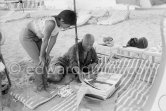 Pablo Picasso and Paloma Picasso viewing the dummy for the book "Pablo Picasso at Work" by Edward Quinn. Golfe-Juan 1961. - Photo by Edward Quinn