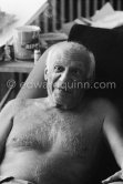 Pablo Picasso with a Ripolin color can in the background. La Californie, Cannes 1961. - Photo by Edward Quinn
