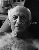 Pablo Picasso with a Ripolin color can behind him. La Californie, Cannes 1961. - Photo by Edward Quinn