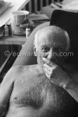 Pablo Picasso with a Ripolin color can behid him. La Californie, Cannes 1961. - Photo by Edward Quinn