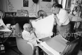 Pablo Picasso and Henri Matarasso, gallery owner and publisher, checking the etching "La Minotauromachie". La Californie, Cannes 1961. - Photo by Edward Quinn