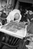 Pablo Picasso and the assistant (?) of Henri Matarasso, gallery owner and publisher, checking the etching "La Minotauromachie". La Californie, Cannes 1961. - Photo by Edward Quinn