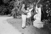 Pablo Picasso and Douglas Cooper with sculpture "Femme au chapeau". La Californie, Cannes 1961. - Photo by Edward Quinn