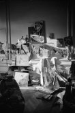 The proverbial disorder of the rooms in which Pablo Picasso works is unique. Beside the large pieces of sculpture in painted iron and plaster hang portraits of Jacqueline and Paloma Picasso surrounded by drawings, objects and notes pinned to the wall. La Californie, Cannes 1961. - Photo by Edward Quinn