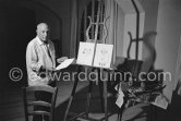 Picasso with color crayon drawings made Sep. 27 1961. for cover of Edward Quinn's book "Picasso at work". Notre-Dame-de-Vie, Mougins 1961. (date of the photo). - Photo by Edward Quinn