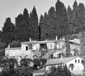 Mas Notre-Dame-de-Vie near Mougins where Picasso lived since 1961. The house was once owned by the Plunket family who gave the painter an Afghan hound called Kaboul as a moving-in present. When Picasso had filled the available rooms with his paintings and drawings, he had the terrace (left) covered to give him space for two more large studios. His bedroom was on the top floor, the living rooms and studio on the ground floor. Mougins 1962. - Photo by Edward Quinn