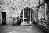 Pablo Picasso with bronze sculpture of God A'a on the terrace at the entrance to Mas Notre-Dame-de-Vie, and Afghan dog Kaboul. Mas Notre-Dame-de-Vie, Mougins 14.2.1962. - Photo by Edward Quinn