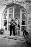Pablo Picasso and Jacqueline with Afghan dog Kaboul on the terrace in front of the entrance to Mas Notre-Dame-de-Vie, Mougins 14.2.1962. - Photo by Edward Quinn