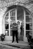 Pablo Picasso and Jacqueline on the terrace in front of the entrance to Mas Notre-Dame-de-Vie, Mougins 14.2.1962. - Photo by Edward Quinn