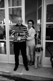 Picasso and Jacqueline with Afghan dog Kaboul on the terrace in front of the entrance to Mas Notre-Dame-de-Vie, Mougins, 14 Feb 1962. - Photo by Edward Quinn