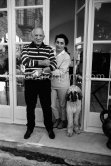 Pablo Picasso and Jacqueline with Afghan dog Kaboul on the terrace in front of the entrance to Mas Notre-Dame-de-Vie, Mougins 14.2.1962. - Photo by Edward Quinn