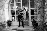 Pablo Picasso and Jacqueline on the terrace in front of the entrance to Mas Notre-Dame-de-Vie, Mougins 14.2.1962. - Photo by Edward Quinn