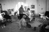 Pablo Picasso and Jacqueline with Afghan dog Kaboul and dachshund Lump. Mas Notre-Dame-de-Vie, Mougins 14.2.1962. - Photo by Edward Quinn