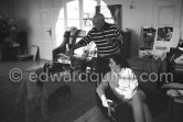 Pablo Picasso and Jacqueline with Afghan dog Kaboul and dachshund Lump. Mas Notre-Dame-de-Vie, Mougins 14.2.1962. - Photo by Edward Quinn