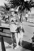 Pablo Picasso with Afghan dog Kaboul. Croisette de Cannes 1963. - Photo by Edward Quinn