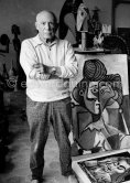 Pablo Picasso in the room that became known as the viewing room. He would arrange his work so that he could see it from the living room every time he passed. He liked to bring his close friends there for a private viewing. Mas Notre-Dame-de-Vie, Mougins 1964. - Photo by Edward Quinn