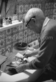 Pablo Picasso washing a linocut print to remove surplus ink. Even though he was nearly eighty at the time he did this work, he enjoyed the physical effort and the adventure. Mas Notre-Dame-de-Vie, Mougins 1964. - Photo by Edward Quinn