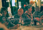 After the bullfight: from left: unknown person, Pablo Picasso, Hélène Parmesan. In a restaurant probably at Fréjus 1965. - Photo by Edward Quinn