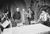 Pablo Picasso, Jacqueline and Dr. Jacques Hepp (surgeon) and wife Myriam in the gardens of Mas Notre-Dame-de-Vie. First photos after surgery at British-American Hospital in Paris. Mougins 1965. - Photo by Edward Quinn