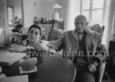 Jacqueline holding Pablo Picasso's hand. One of the first photos after his surgery at the British-American Hospital in Paris. Notre-Dame-De-Vie, Mougins 1965. - Photo by Edward Quinn