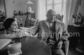 Jacqueline holding Pablo Picasso's hand. One of the first photos after his surgery at the British-American Hospital in Paris. Notre-Dame-De-Vie, Mougins 1965. - Photo by Edward Quinn