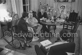 Birthday of Jacqueline (24.2.66). Jacqueline, Spanish publisher Gustavo Gili and his wife, Anna Maria Torra Amat, Hélène Parmelin, Sylvie, nurse of Pablo Picasso with Quinn's book "Pablo Picasso à l'oeuvre". Mas Notre-Dame-de-Vie, Mougins 1966. - Photo by Edward Quinn