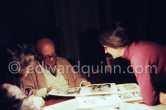 Pablo Picasso, Jacqueline and Mila Gagarine viewing the layout of the newest "Le Zervos", the catalogue raisonné of the works of Pablo Picasso. Visit of Mila Gagarine (Cahiers d'art) and William (Bill) Rubin, MoMA. One of the last photos of Pablo Picasso by Edward Quinn. Viewing Mas Notre-Dame-de-Vie, Mougins 7. Jan 1972. - Photo by Edward Quinn